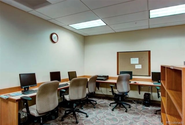 home office featuring a paneled ceiling