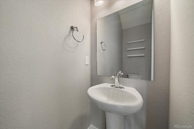 1632 Lowell Blvd Unit 5, Denver, CO 80204 - bathroom with a sink and a textured wall