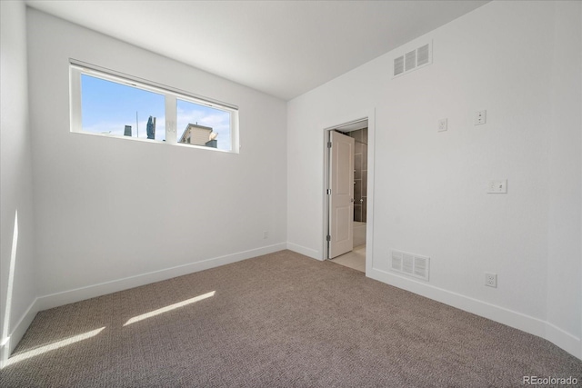 1632 Lowell Blvd Unit 5, Denver, CO 80204 - carpeted empty room featuring healthy amount of natural light