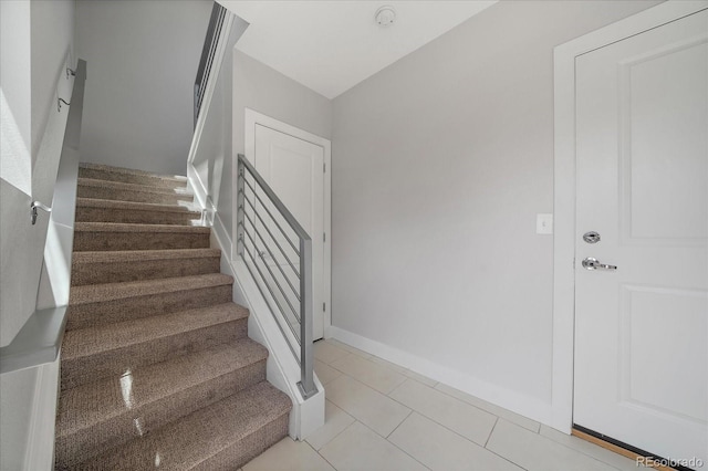 1632 Lowell Blvd Unit 5, Denver, CO 80204 - stairs with tile patterned flooring and baseboards