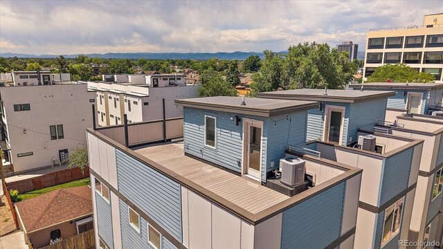 1632 Lowell Blvd Unit 5, Denver, CO 80204 - rear view of property featuring a mountain view