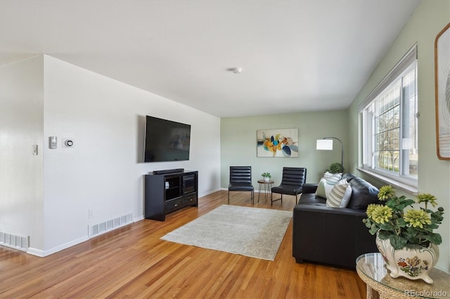 3406 E Fair Pl, Centennial, CO 80121 - living area with wood finished floors and baseboards