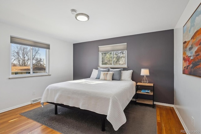 3406 E Fair Pl, Centennial, CO 80121 - bedroom with wood finished floors and baseboards