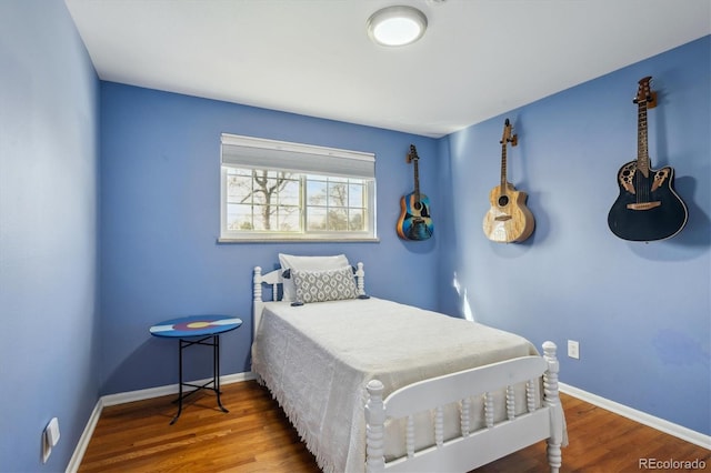 3406 E Fair Pl, Centennial, CO 80121 - bedroom with wood finished floors and baseboards
