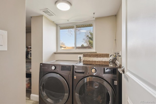 3406 E Fair Pl, Centennial, CO 80121 - laundry area featuring separate washer and dryer and wood finished floors