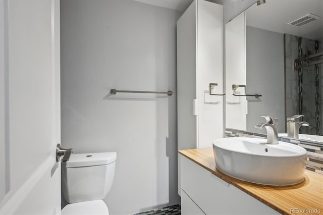 3406 E Fair Pl, Centennial, CO 80121 - bathroom featuring vanity and toilet