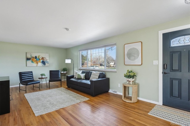 3406 E Fair Pl, Centennial, CO 80121 - living area featuring wood finished floors and baseboards