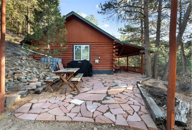 view of patio with a grill