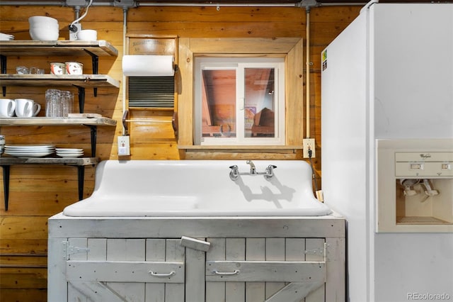 bathroom featuring wood walls