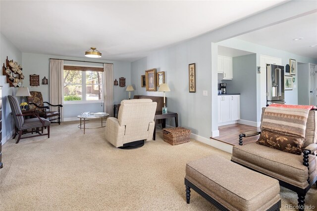 10886 E Berry Ave, Englewood, CO 80111 - living area with light carpet and baseboards