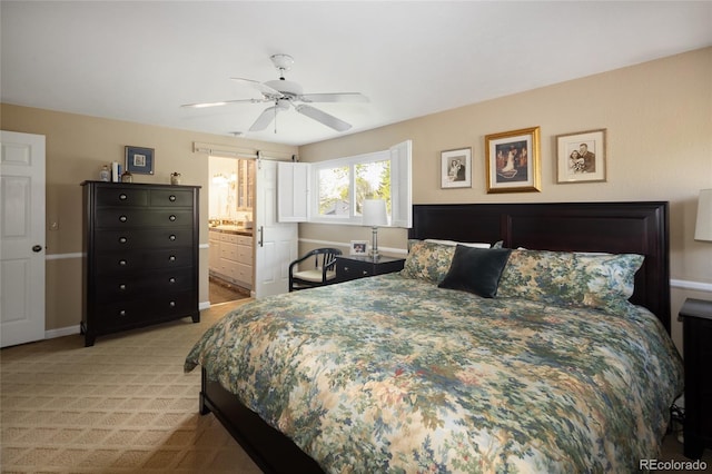 10886 E Berry Ave, Englewood, CO 80111 - bedroom with light carpet, a ceiling fan, and ensuite bath