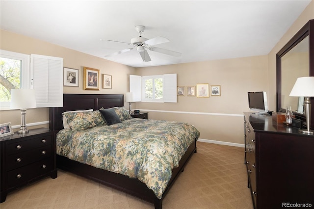 10886 E Berry Ave, Englewood, CO 80111 - bedroom with light carpet, a ceiling fan, and baseboards