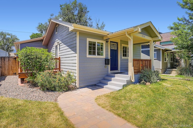 1733 S Gilpin St, Denver, CO 80210 - view of front of home with a porch