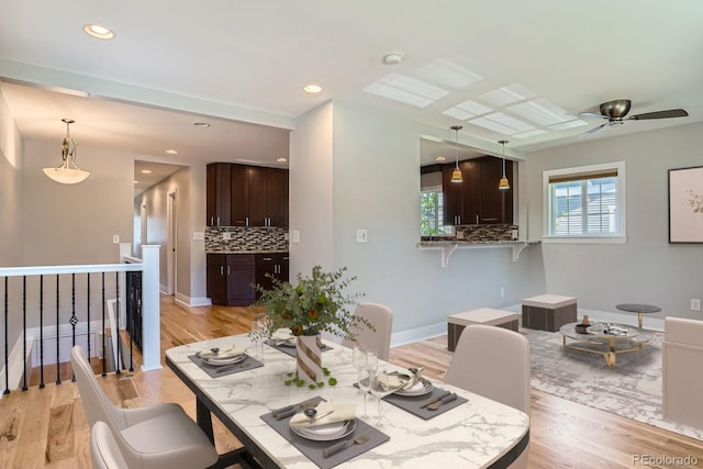 1733 S Gilpin St, Denver, CO 80210 - dining area with light wood-style floors, ceiling fan, and recessed lighting