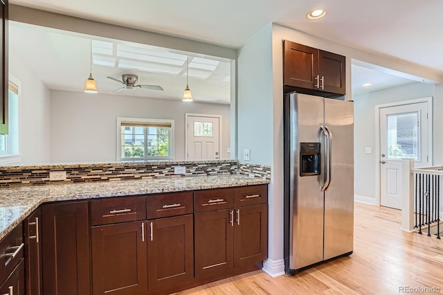1733 S Gilpin St, Denver, CO 80210 - kitchen with stainless steel fridge with ice dispenser, tasteful backsplash, ceiling fan, light wood finished floors, and dark brown cabinets