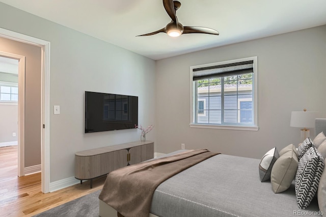 1733 S Gilpin St, Denver, CO 80210 - bedroom featuring light wood-style flooring and a ceiling fan