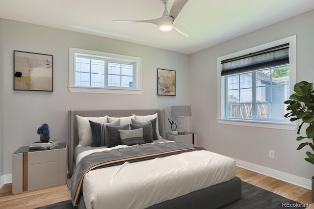 1733 S Gilpin St, Denver, CO 80210 - bedroom featuring light wood-type flooring and a ceiling fan
