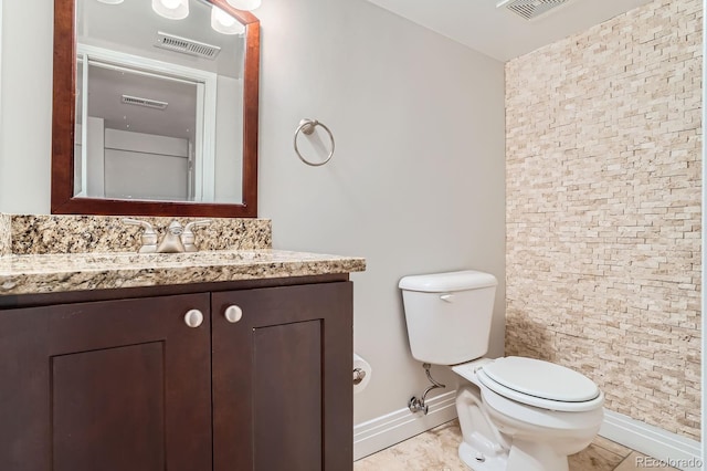 1733 S Gilpin St, Denver, CO 80210 - bathroom featuring baseboards and vanity