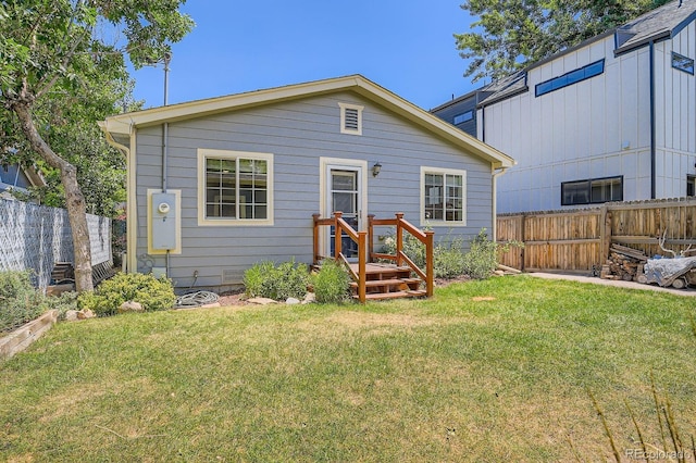 1733 S Gilpin St, Denver, CO 80210 - back of house with a fenced backyard