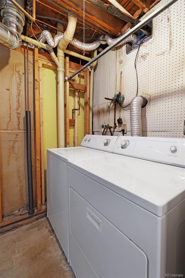 laundry area with laundry area and washing machine and dryer