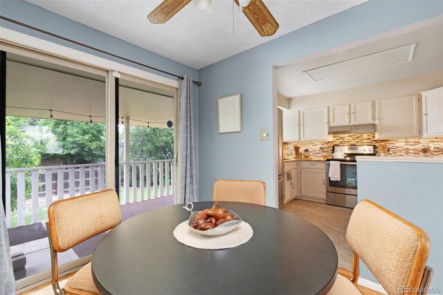 12642 E Ohio Ave, Aurora, CO 80012 - dining space with ceiling fan and a textured ceiling