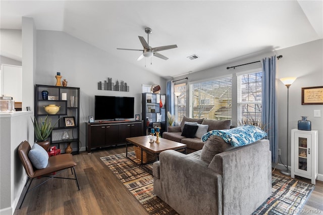 19437 E Mann Creek Dr Unit A, Parker, CO 80134 - living area featuring vaulted ceiling, visible vents, dark wood-type flooring, baseboards, and ceiling fan