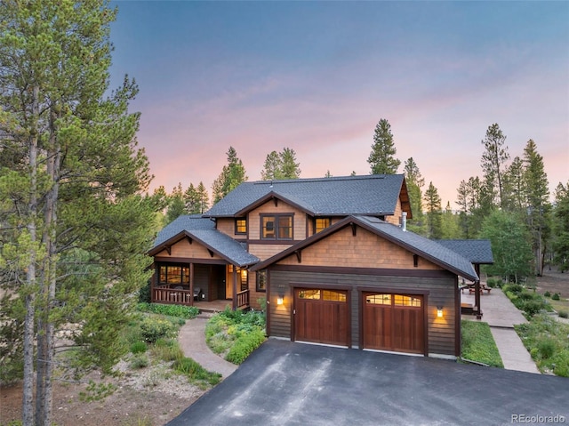 craftsman-style home with a garage