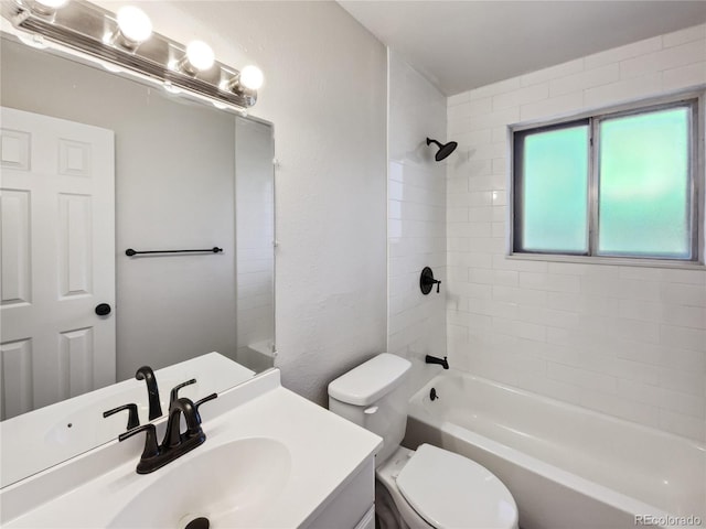 full bathroom with toilet, a textured wall, vanity, and shower / bathtub combination