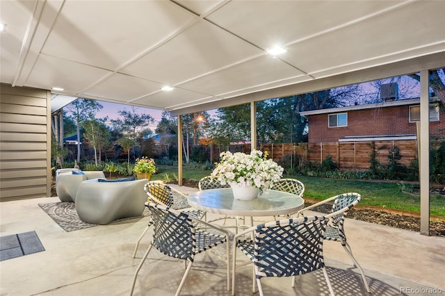 8955 E 19th Ave, Aurora, CO 80010 - fenced backyard featuring outdoor dining space and a patio area