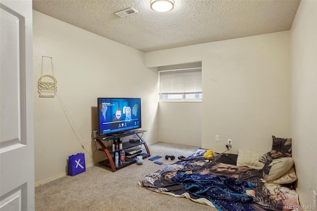 995 Holli Springs Ln, Colorado Springs, CO 80907 - bedroom featuring carpet floors and a textured ceiling