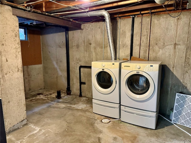 basement with washing machine and clothes dryer