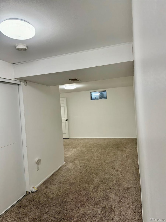 basement featuring carpet floors