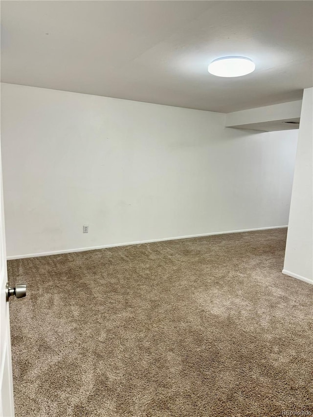 empty room featuring carpet floors