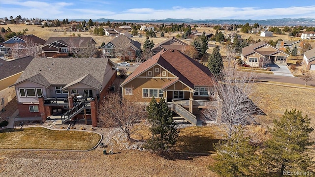 bird's eye view with a residential view and a mountain view