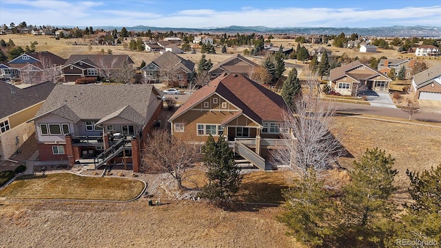 aerial view with a residential view and a mountain view