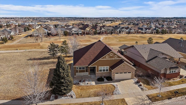 drone / aerial view with a residential view