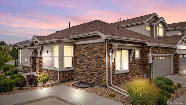 view of front of home with a garage