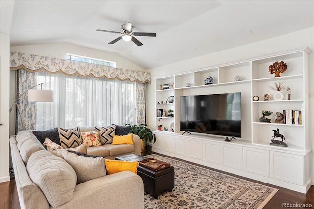 living room with ceiling fan, dark hardwood / wood-style floors, and lofted ceiling