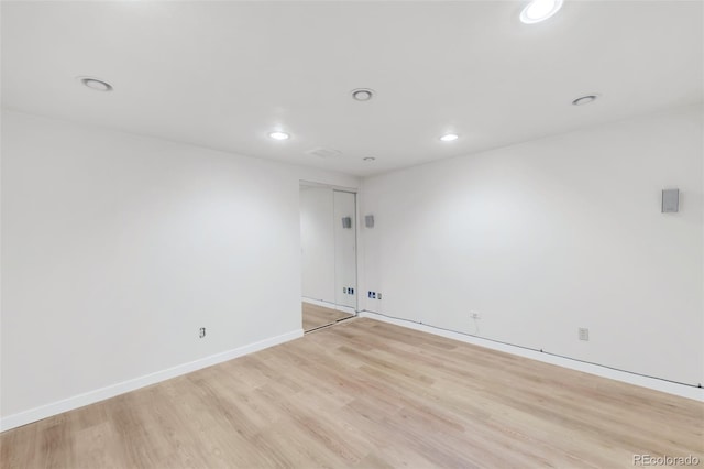 4034 S Atchison Way, Aurora, CO 80014 - empty room featuring light wood finished floors and recessed lighting