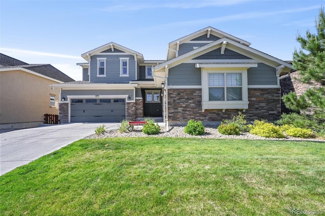 craftsman-style house featuring a garage and a front yard