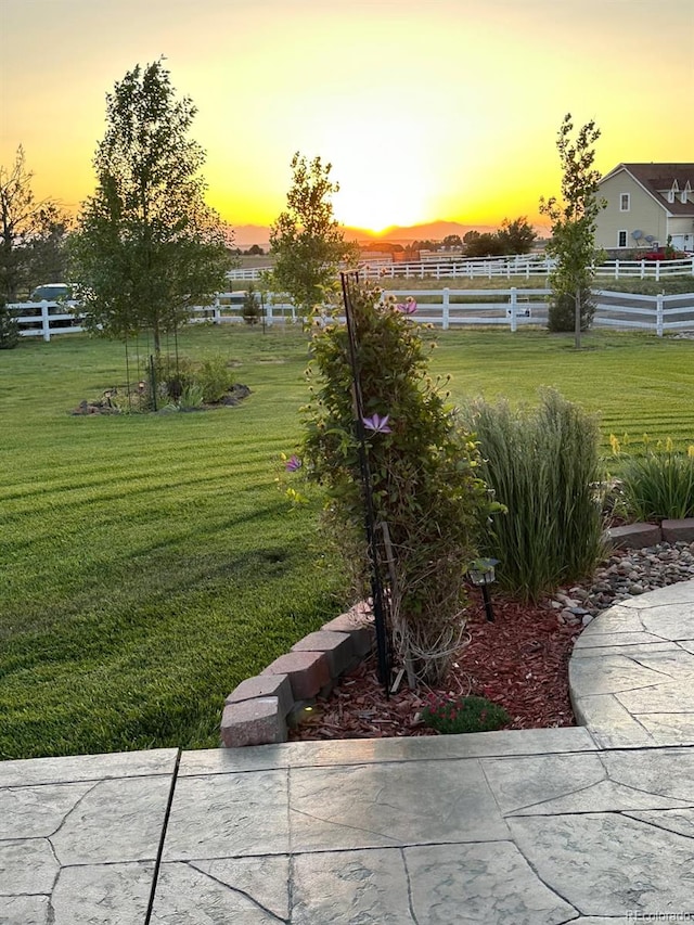 970 Inyokern Ct, Watkins, CO 80137 - view of yard at dusk