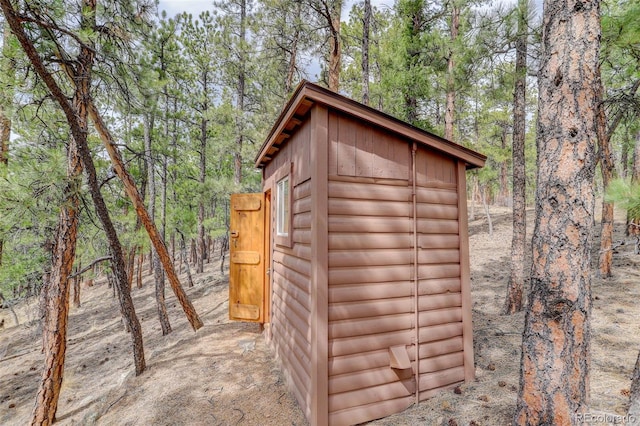 307 Virginia Rd, Bailey, CO 80421 - view of shed with a forest view
