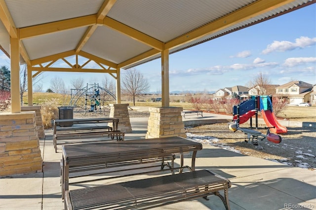 view of patio featuring a playground