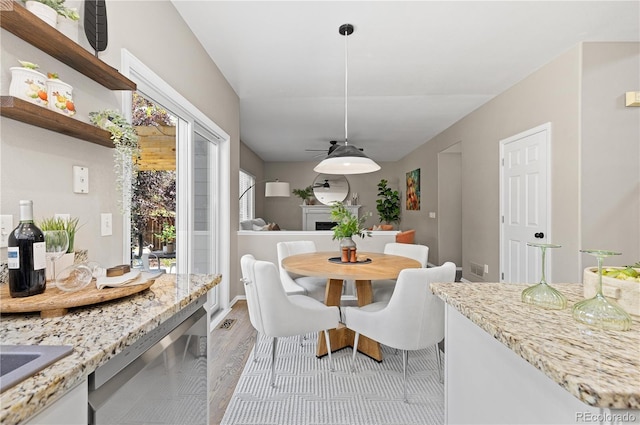 8982 Miners Pl, Highlands Ranch, CO 80126 - dining space with light wood-style floors and ceiling fan