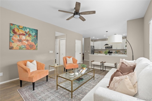 8982 Miners Pl, Highlands Ranch, CO 80126 - living room with wood finished floors, ceiling fan, and recessed lighting