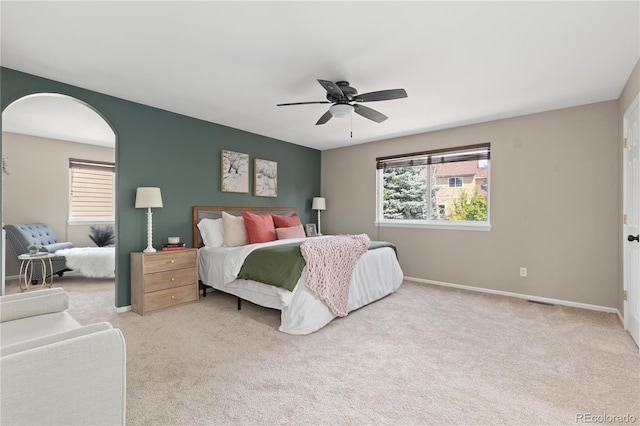 8982 Miners Pl, Highlands Ranch, CO 80126 - carpeted bedroom featuring ceiling fan and arched walkways