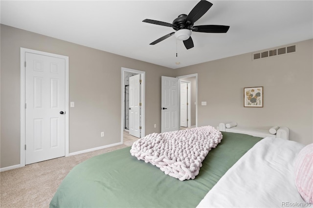 8982 Miners Pl, Highlands Ranch, CO 80126 - bedroom with light carpet, ensuite bathroom, and ceiling fan