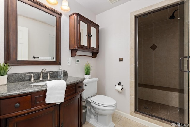 8982 Miners Pl, Highlands Ranch, CO 80126 - bathroom featuring vanity, a shower stall, and tile patterned flooring
