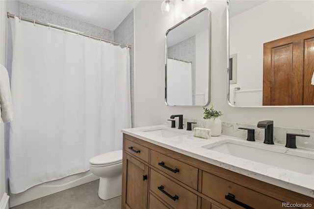 1215 N Emerson St Unit A, Denver, CO 80218 - bathroom featuring double vanity, tile patterned floors, and shower / tub combo with curtain