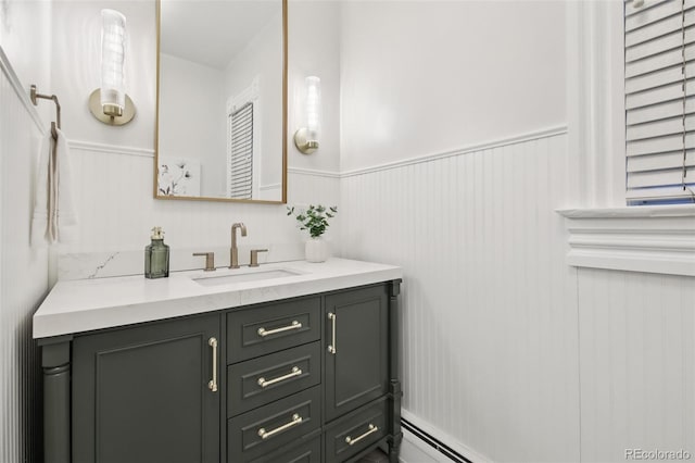 1215 N Emerson St Unit A, Denver, CO 80218 - bathroom featuring vanity and a wainscoted wall